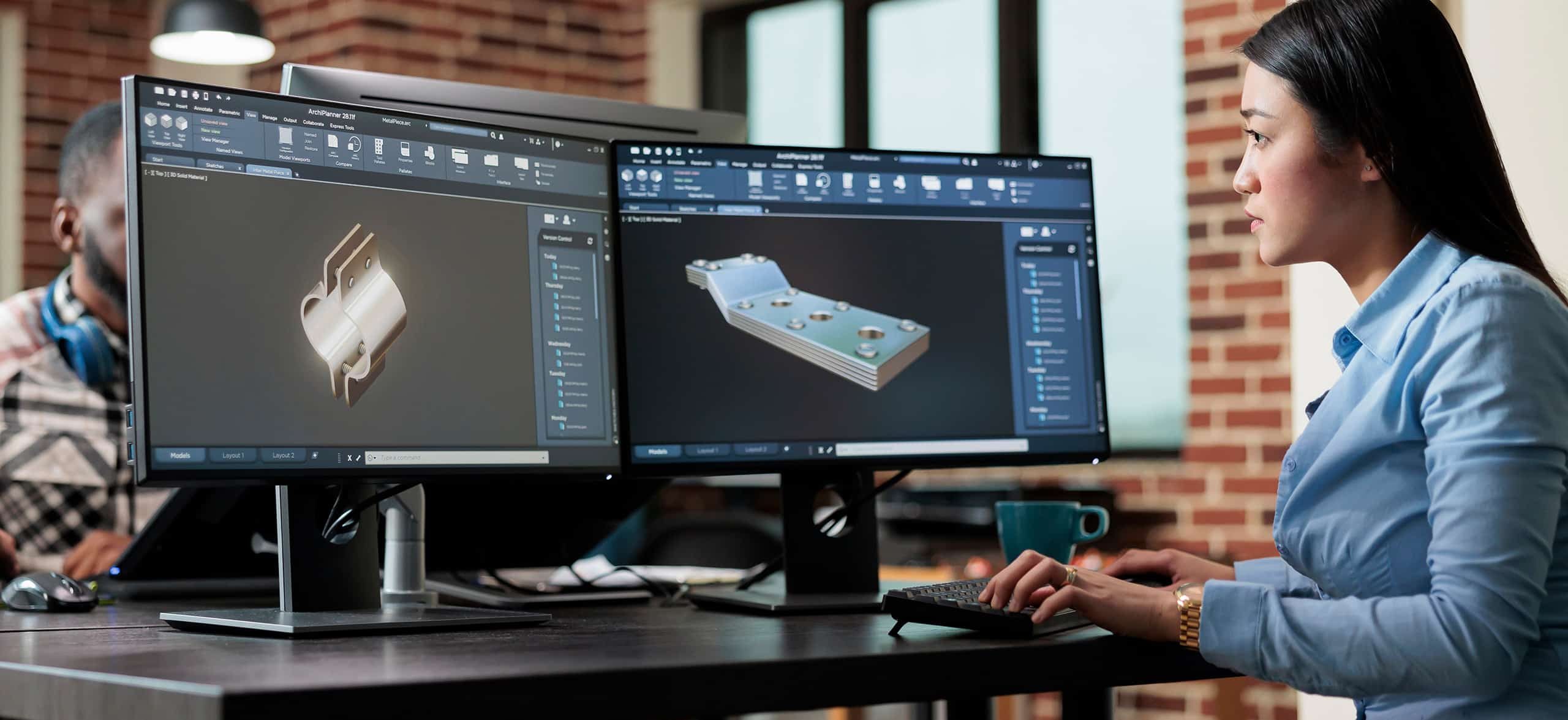 A woman working on 3D renderings on a computer